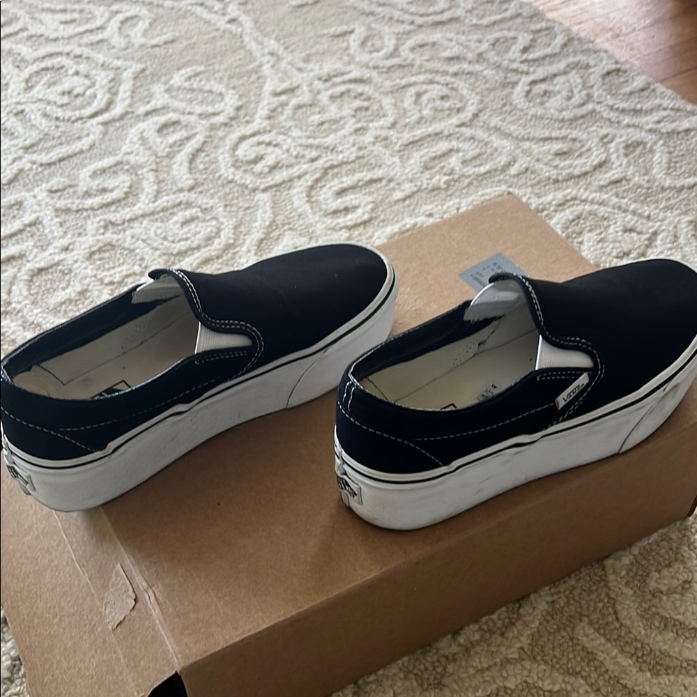 women's Vans Classic Black and White Slip-On Sneakers